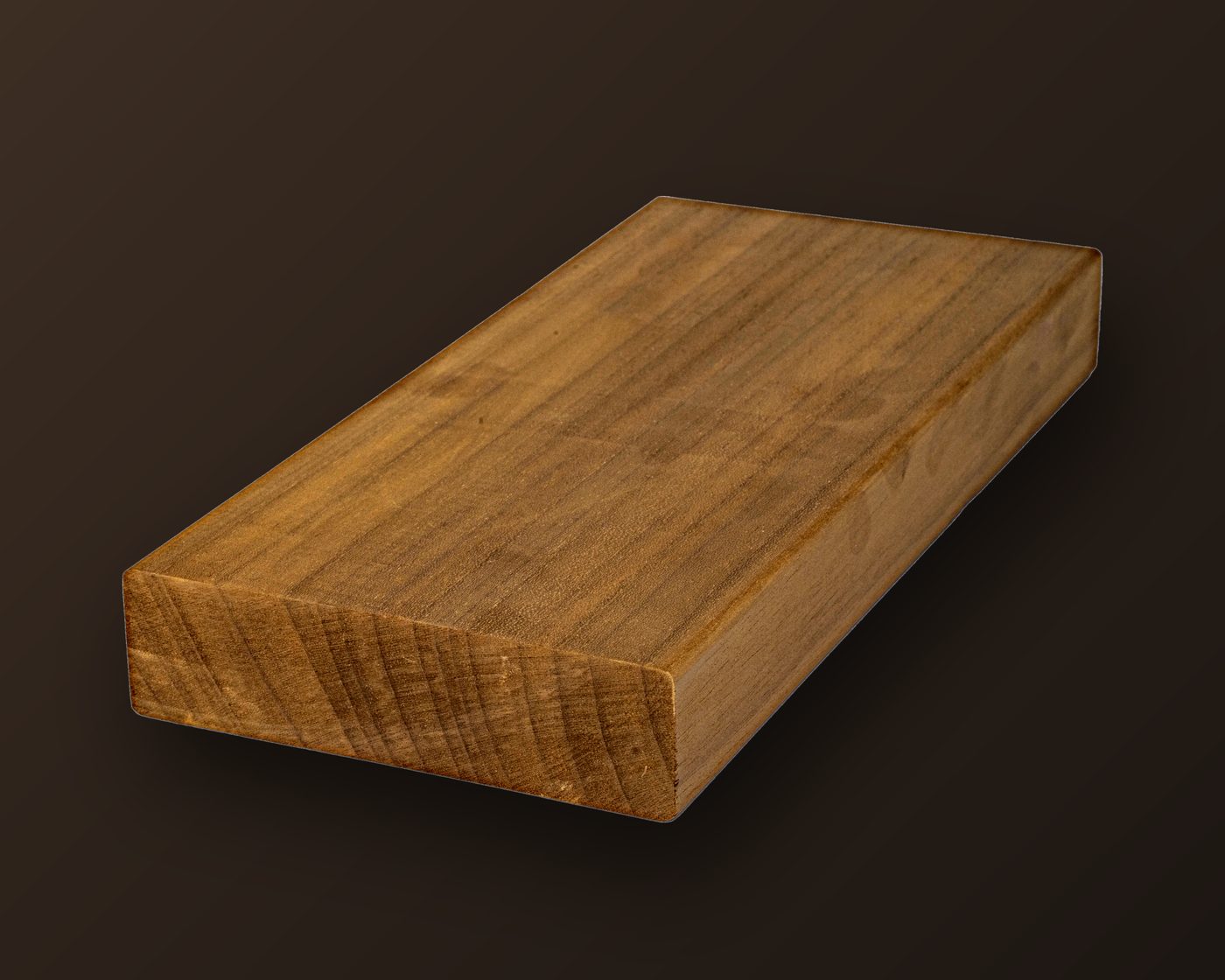 A thermally modified hardwood board, shown at an angle with its end grain and profile
